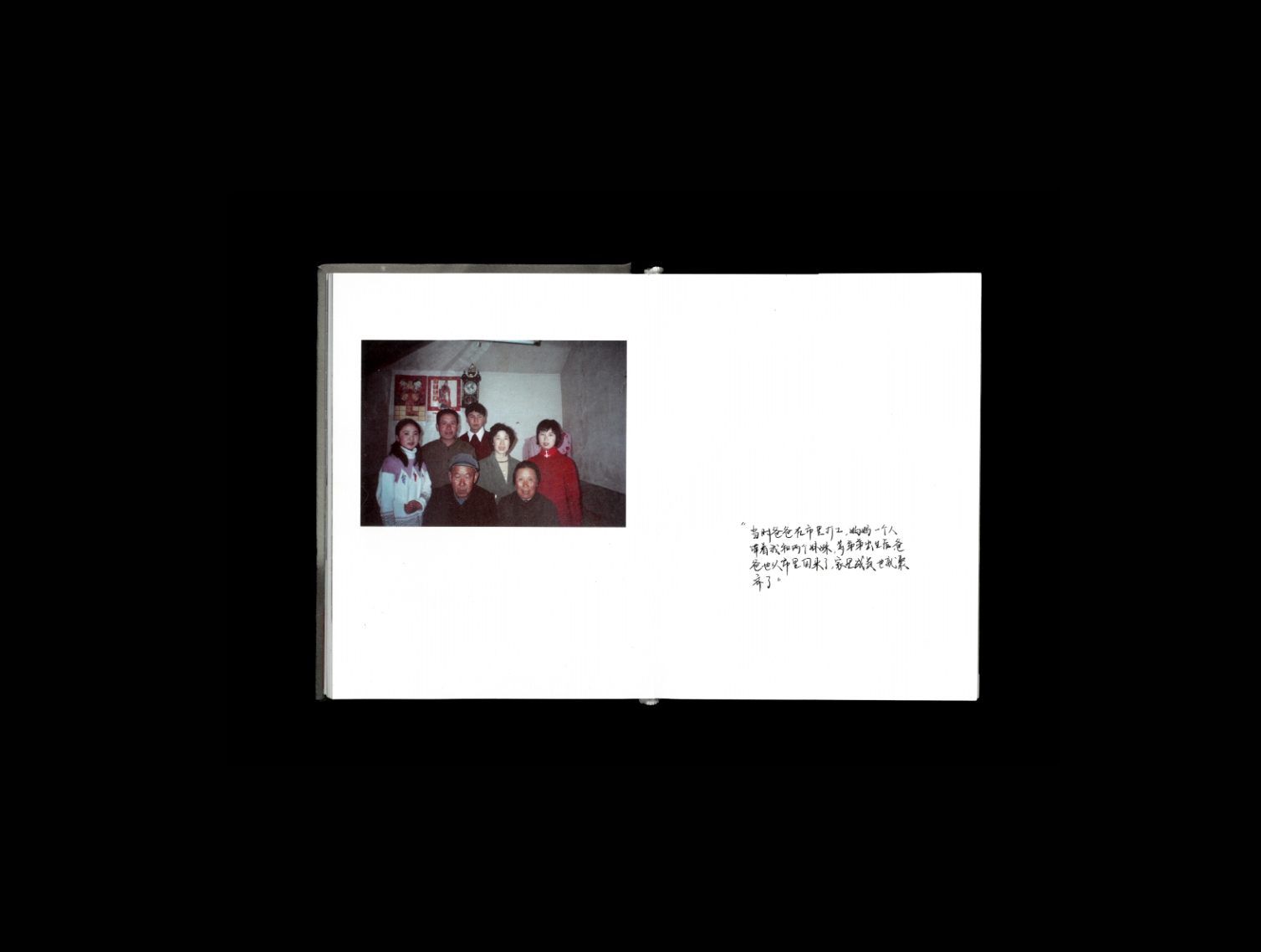 Artist book spread containing a family photograph